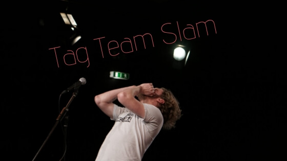 Jay Nightwind rufend am Mikrofon - Titelbild zum tag-Team-Slam Essen